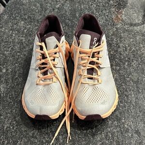 On Cloud Running Shoes with Coral and Gray Accents
